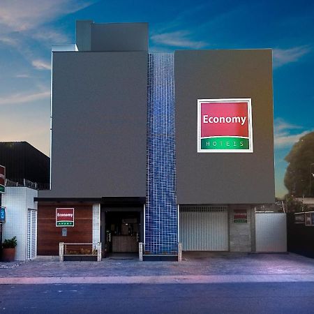 Economy Apart Natal Luaran gambar